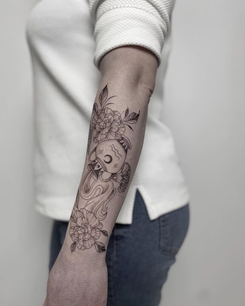 aquarius-floral-water-vase-forearm-tattoo