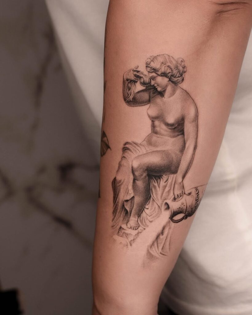 aquarius-statue-water-pouring-tattoo