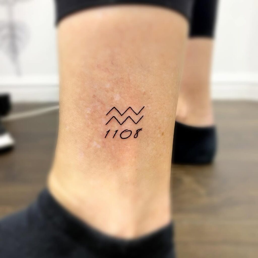 aquarius-wave-symbol-with-date-ankle-tattoo