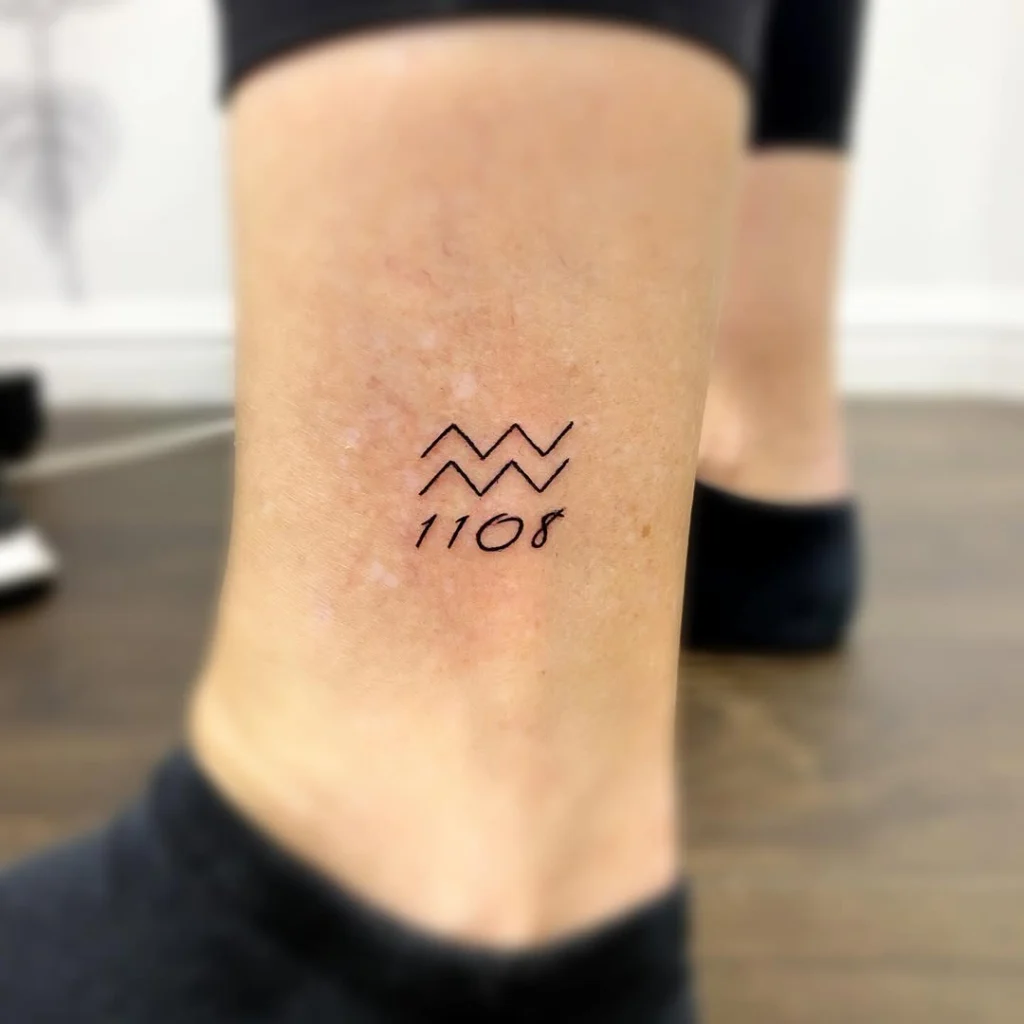 aquarius-wave-symbol-with-date-ankle-tattoo