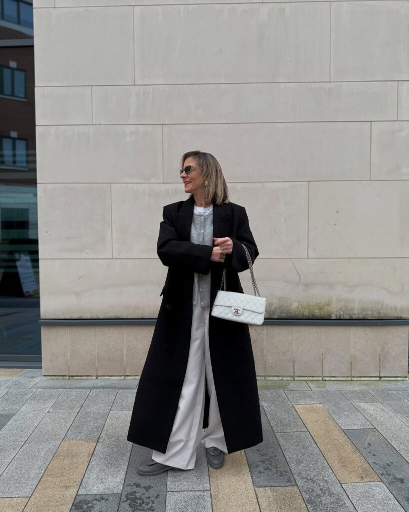 black-overcoat-with-white-trousers