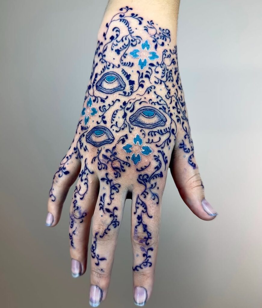 blue-eye-patterned-hand-tattoo-design