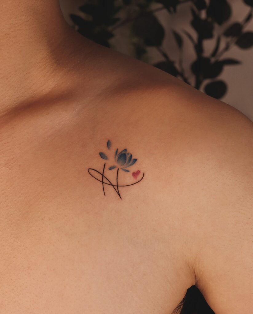 blue-lotus-collarbone-tattoo