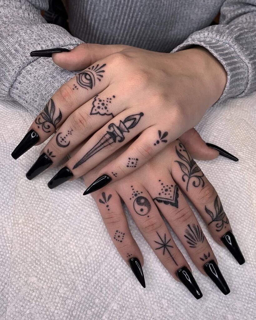 bold-finger-symbolic-tattoo-design