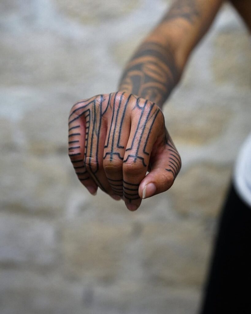 bold-geometric-hand-and-finger-tattoo-design