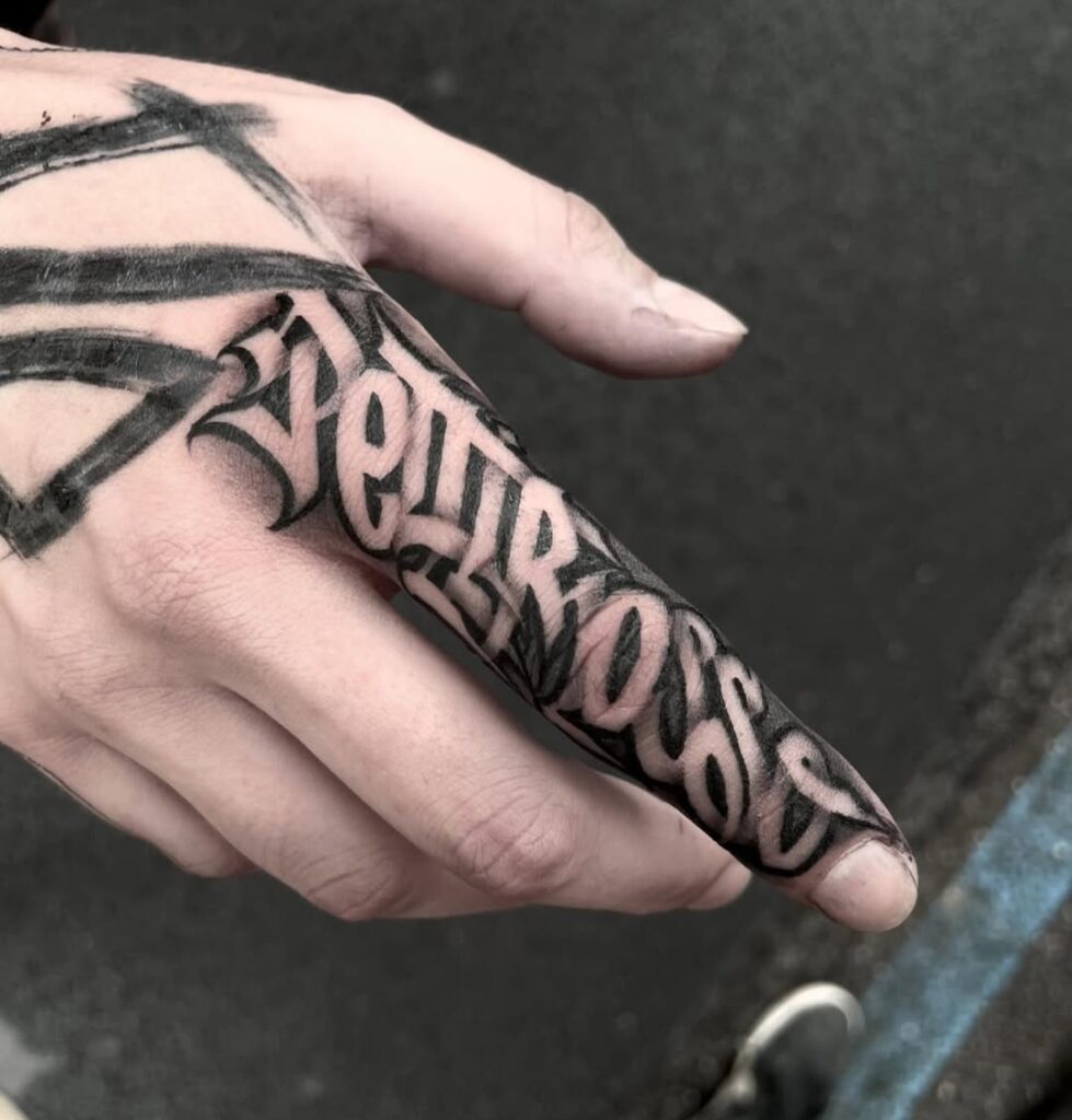 bold-lettering-finger-tattoo-design