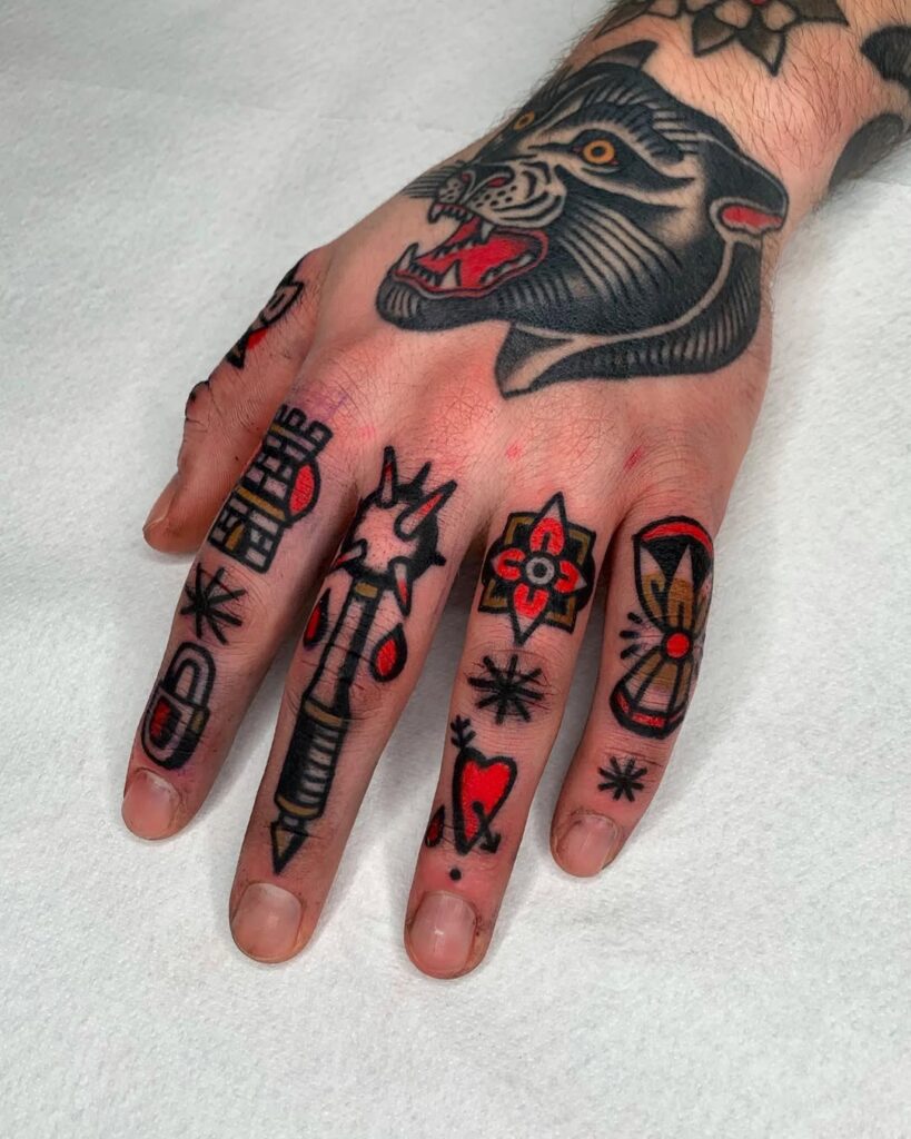 bold-traditional-finger-and-hand-tattoo-design