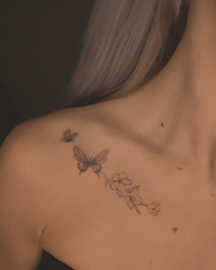 butterfly-and-flower-collarbone-tattoo