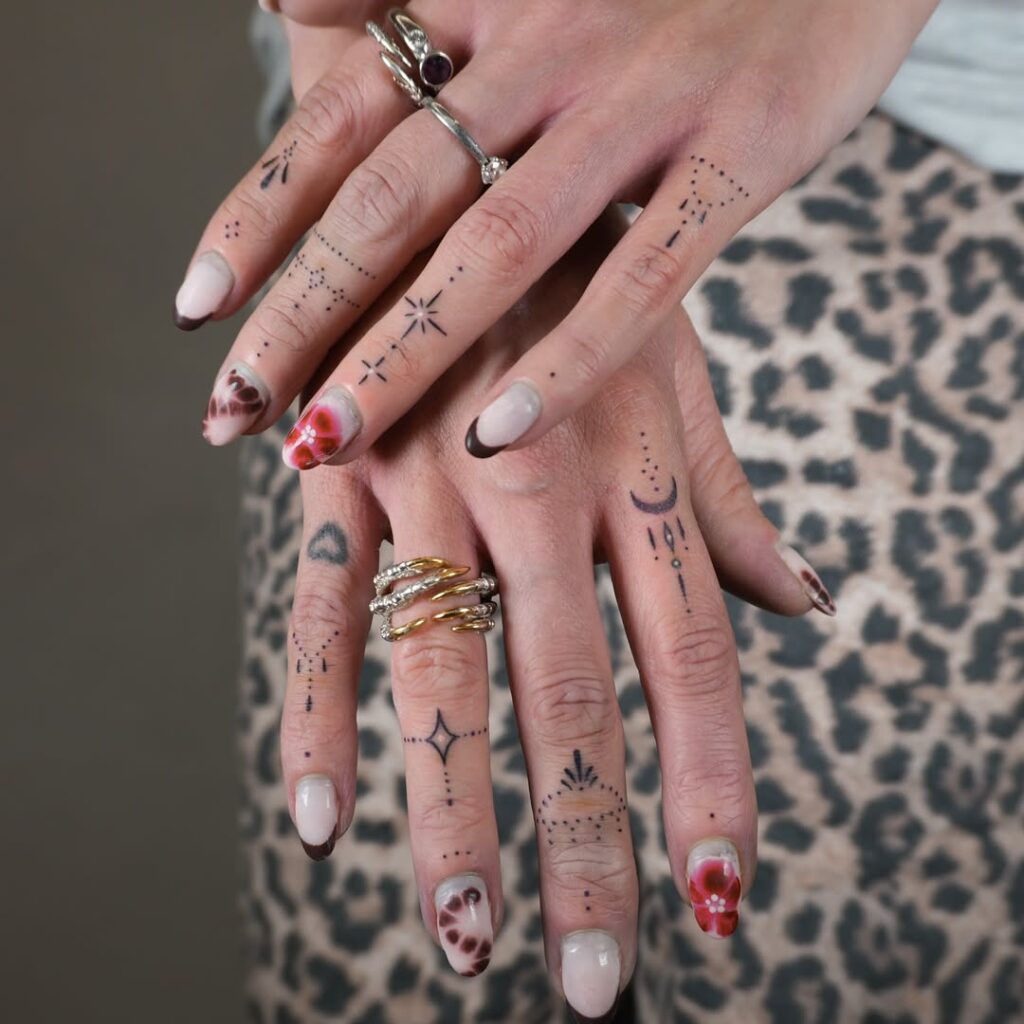 celestial-and-dotted-finger-tattoo-design