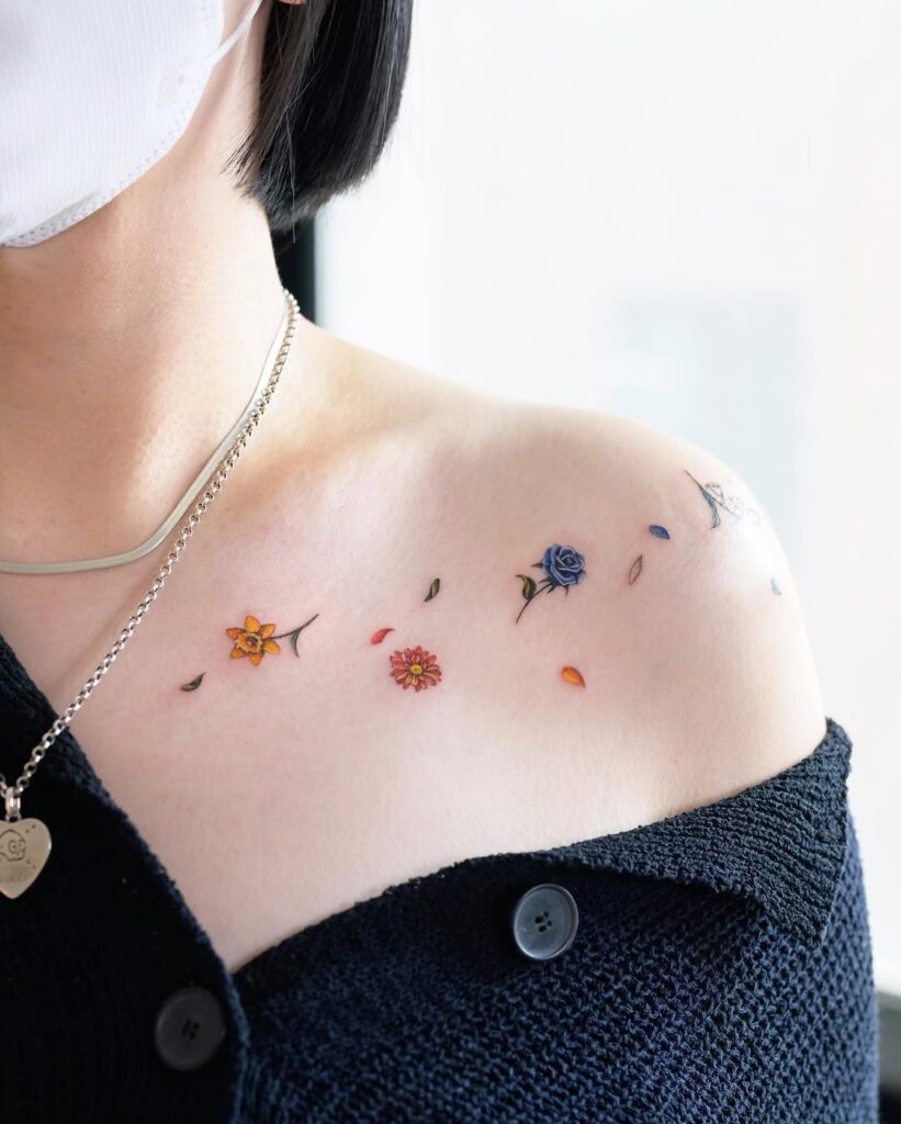 colorful-floral-collarbone-tattoo