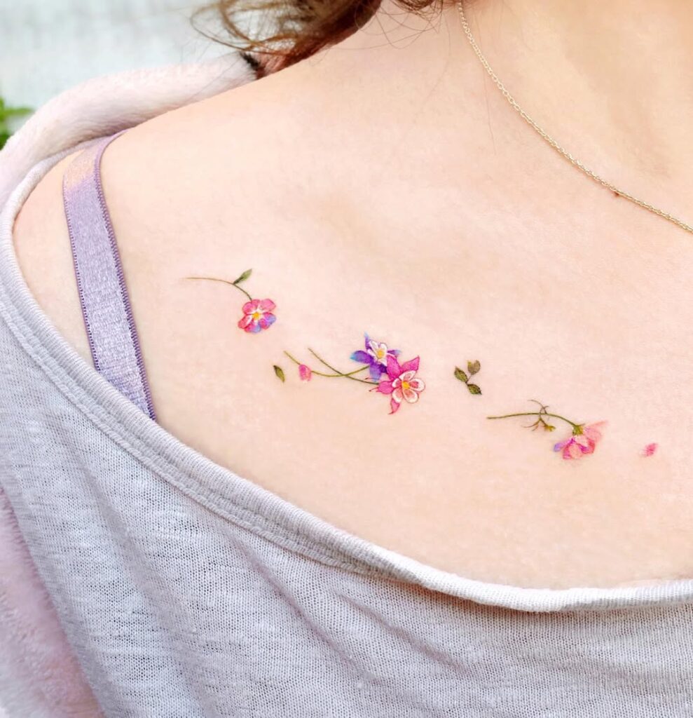 colorful-wildflower-collarbone-tattoo