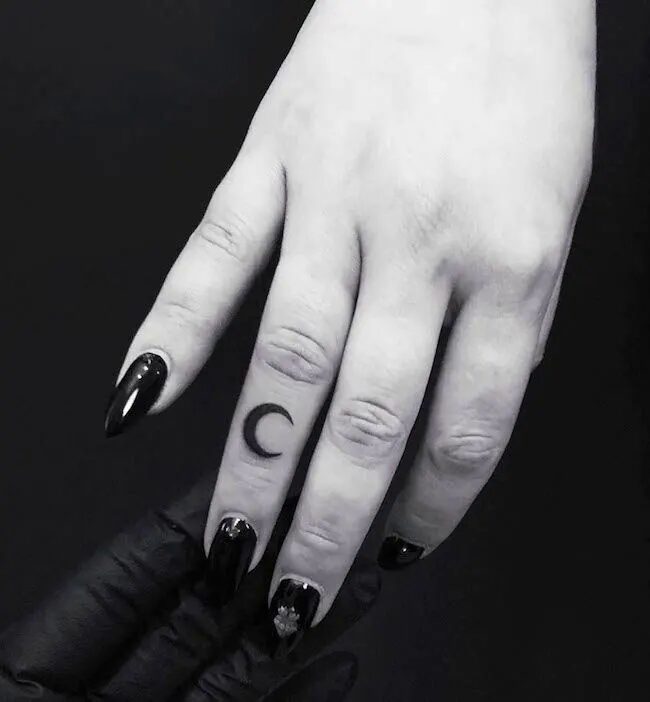 crescent-moon-finger-tattoo