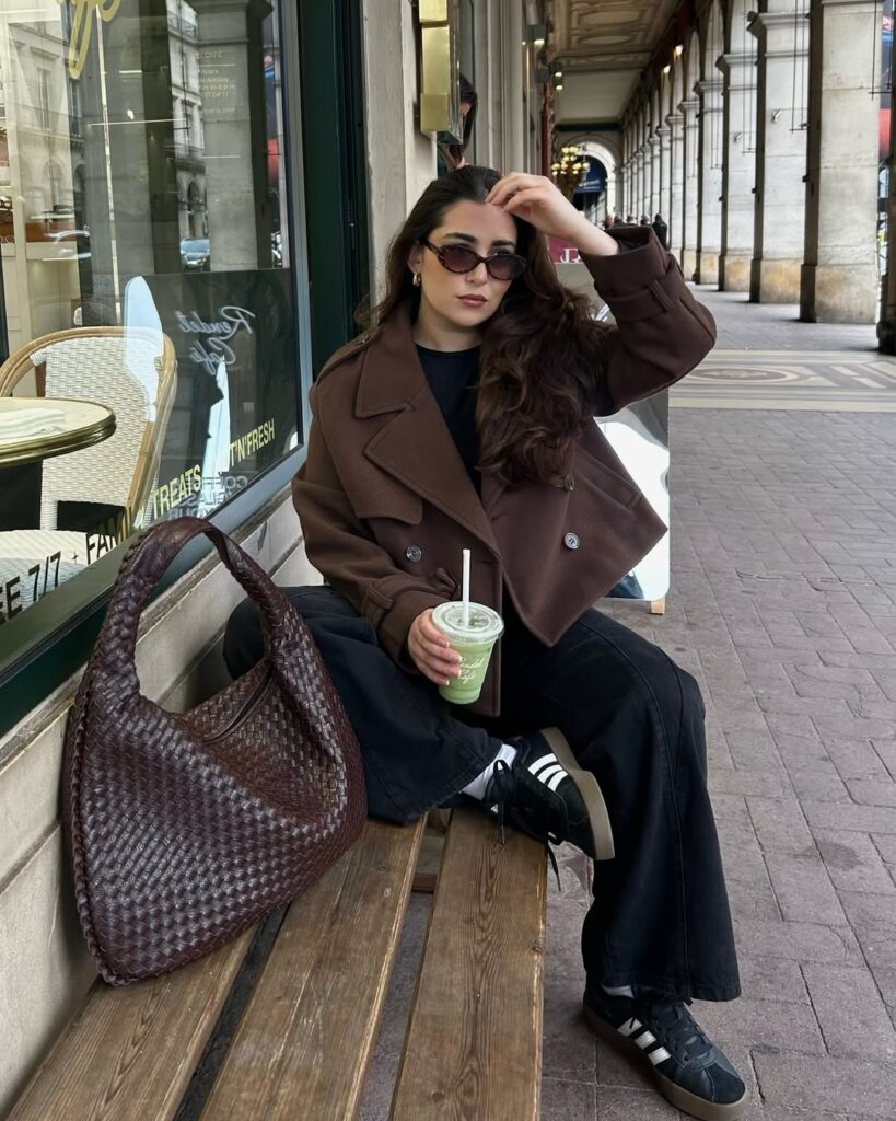 cropped-brown-coat-black-trousers-sneakers-look