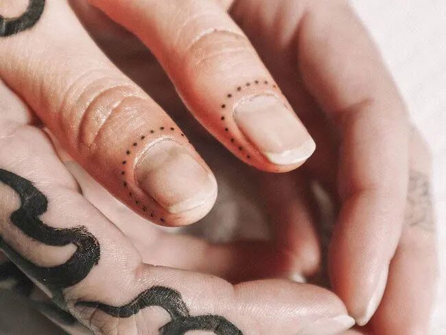 dotted-cuticle-finger-tattoo