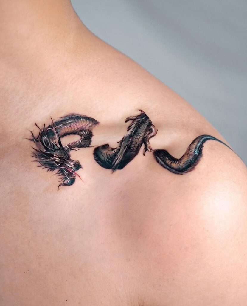 dragon-coiling-collarbone-tattoo