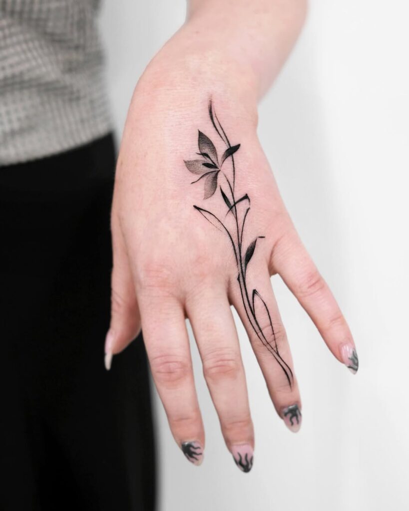 elegant-floral-hand-tattoo-design