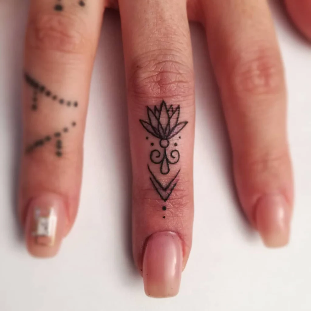 finger-lotus-tattoo-design