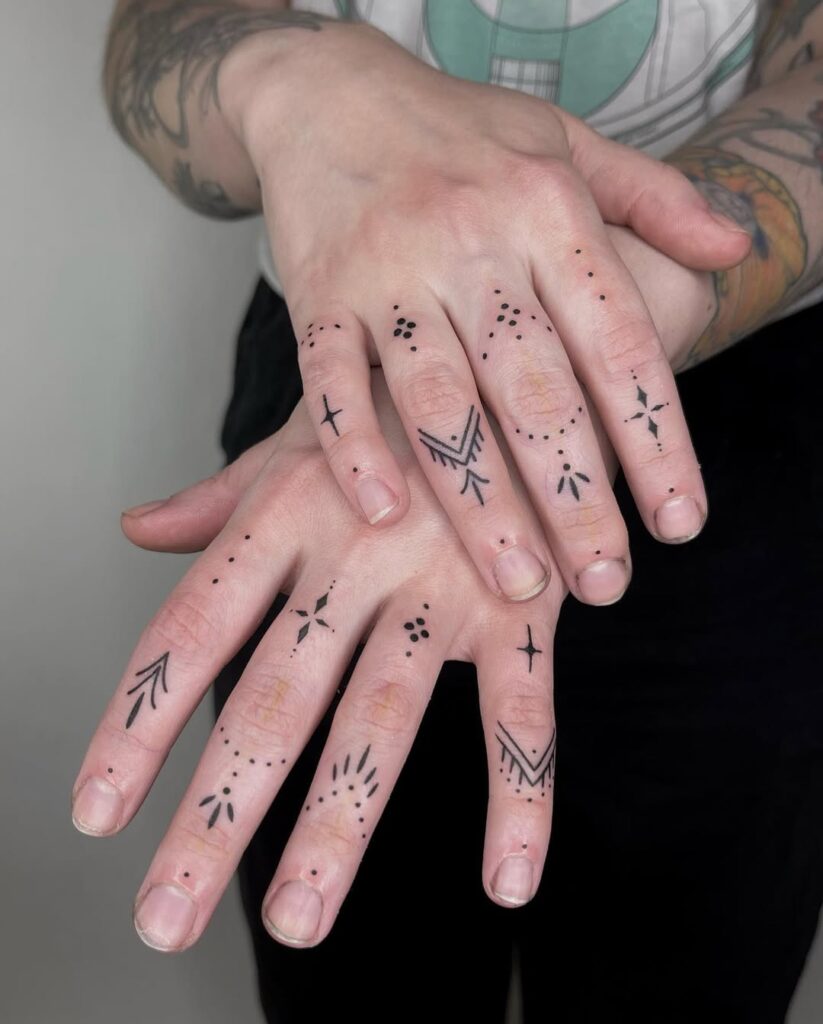 geometric-dotwork-finger-tattoo-design