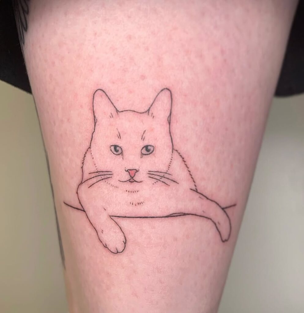 lounging-cat-line-tattoo