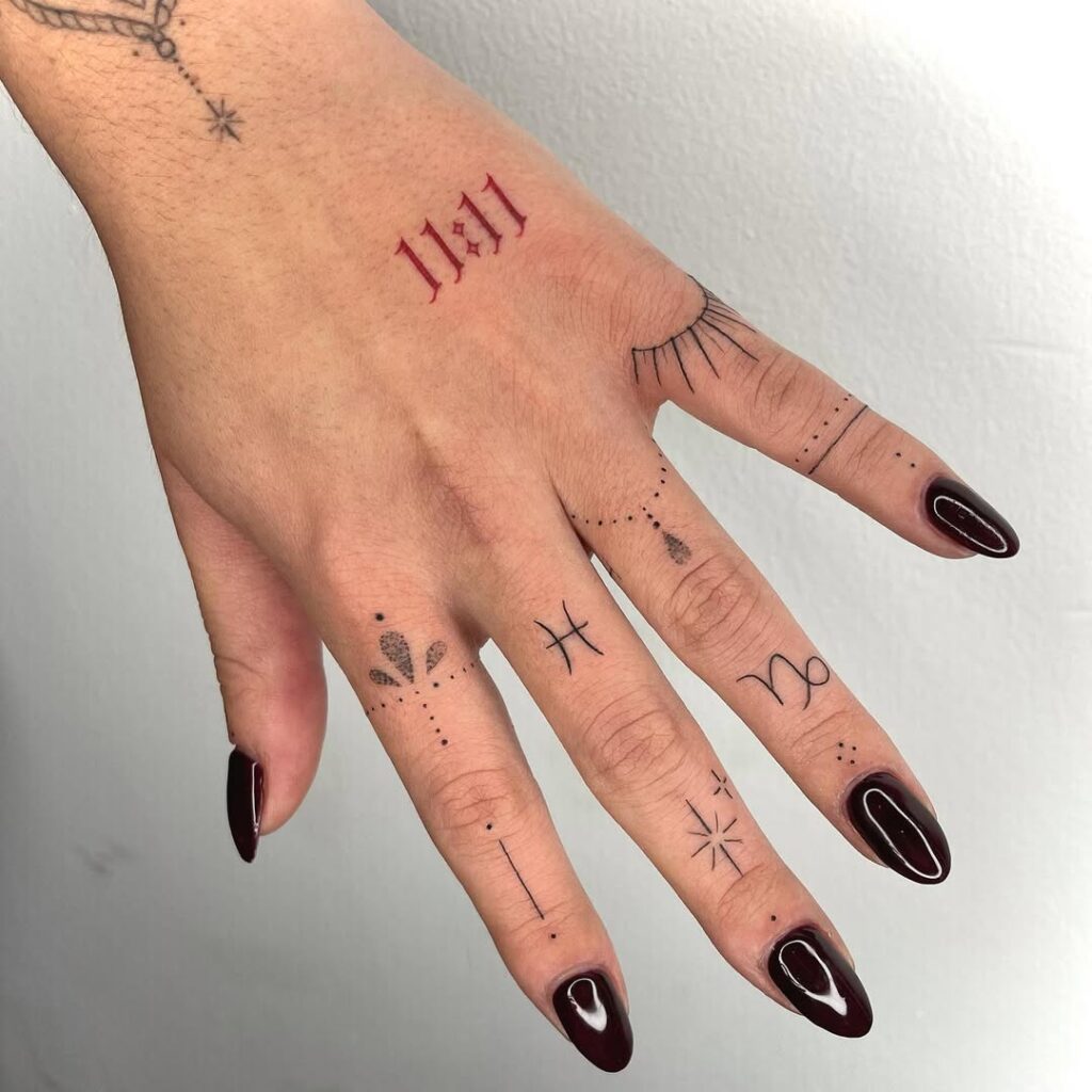 minimalist-astrology-finger-tattoo