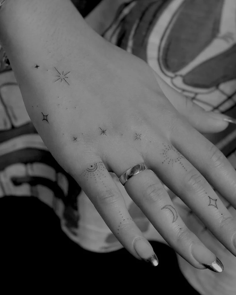 minimalist-celestial-hand-tattoo-design
