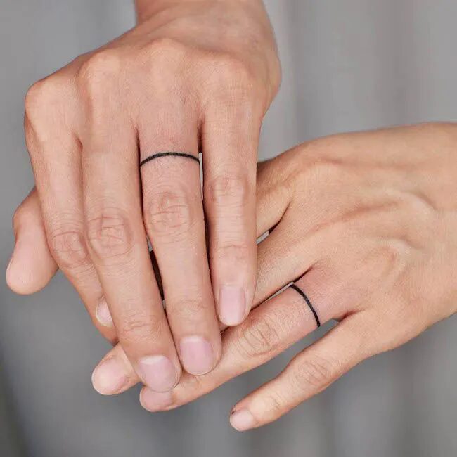 minimalist-finger-ring-tattoo