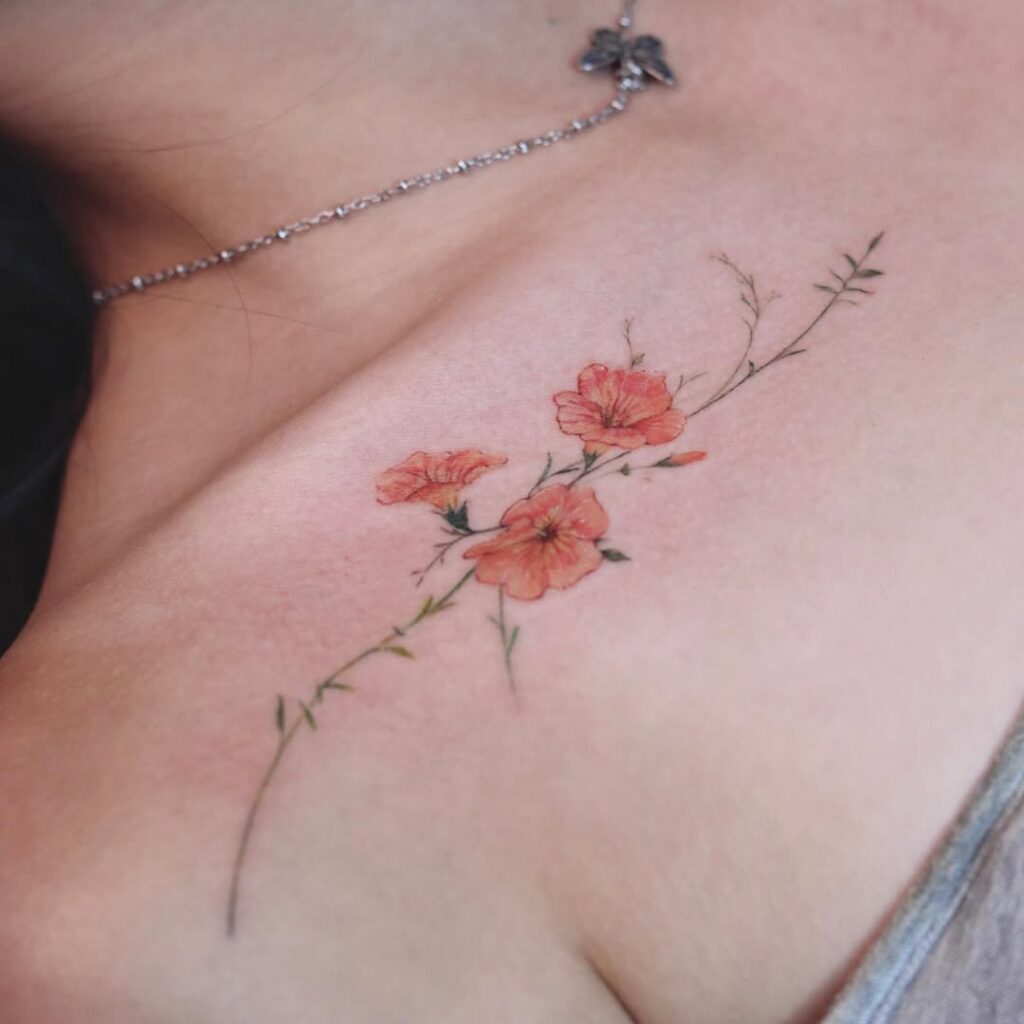 orange-floral-collarbone-tattoo