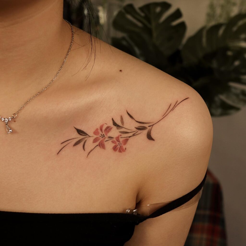 pink-floral-collarbone-tattoo