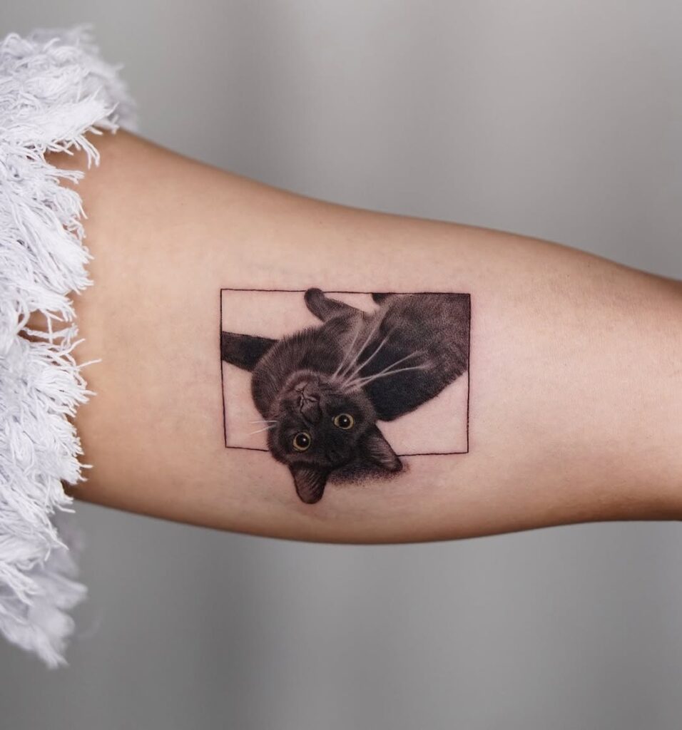 playful-black-cat-tattoo