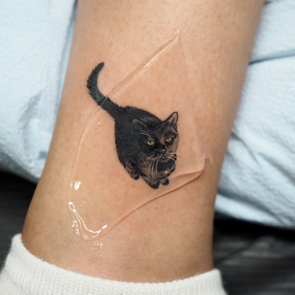 realistic-black-cat-tattoo