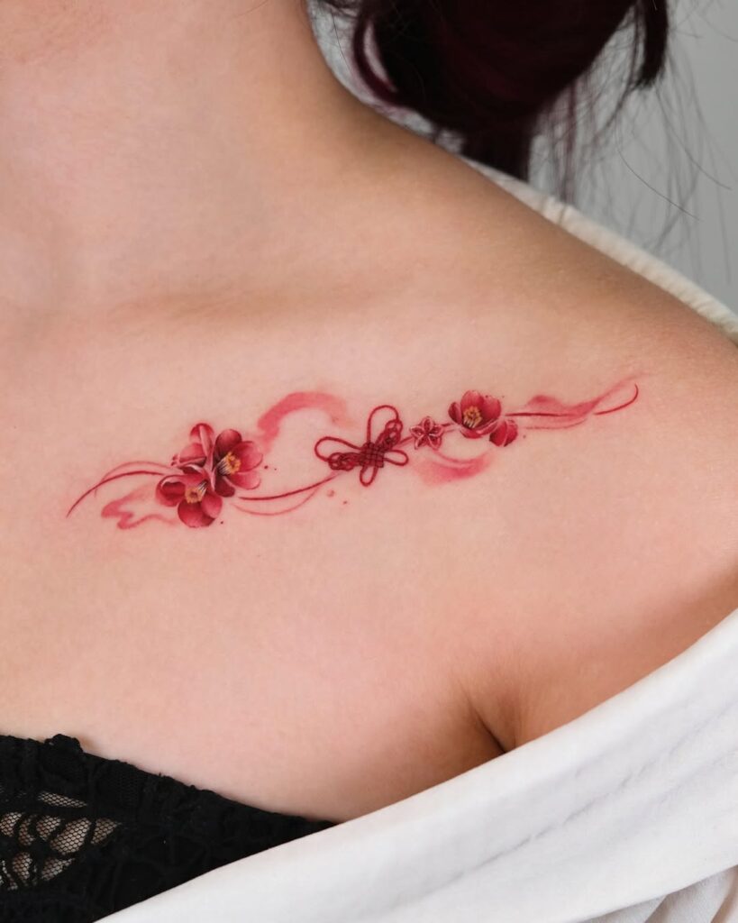 red-floral-collarbone-tattoo