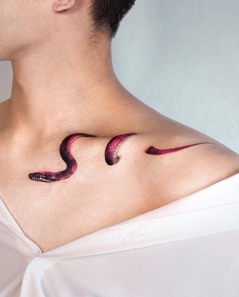 red-snake-collarbone-tattoo