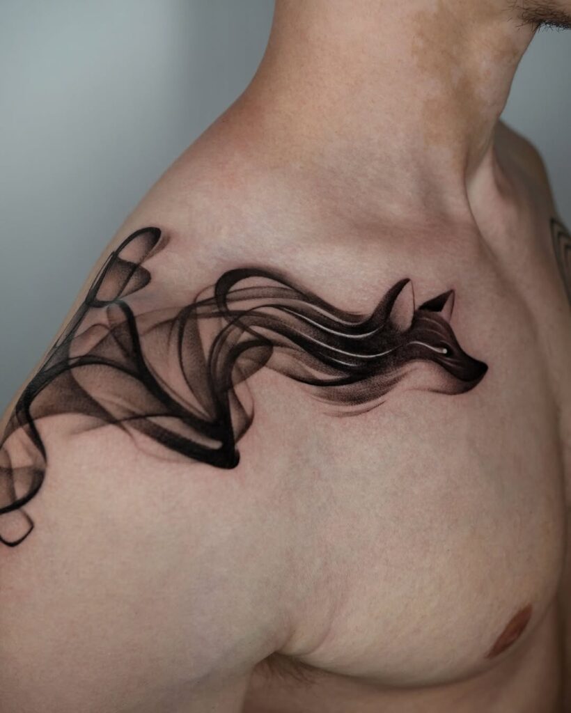 smoke-effect-wolf-collarbone-tattoo