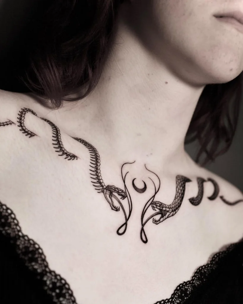 snake-and-symbol-collarbone-tattoo