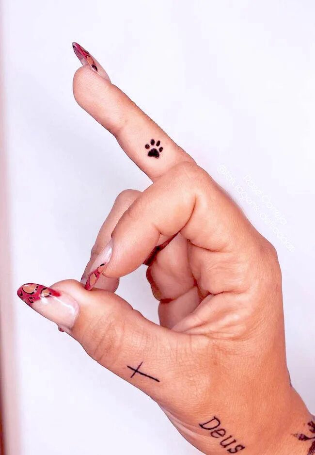 tiny-paw-finger-tattoo