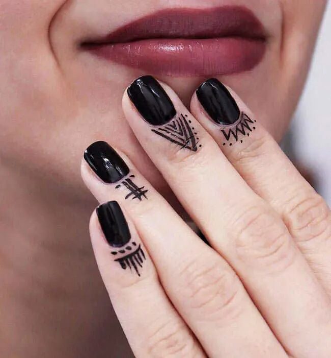 tribal-inspired-finger-tattoo