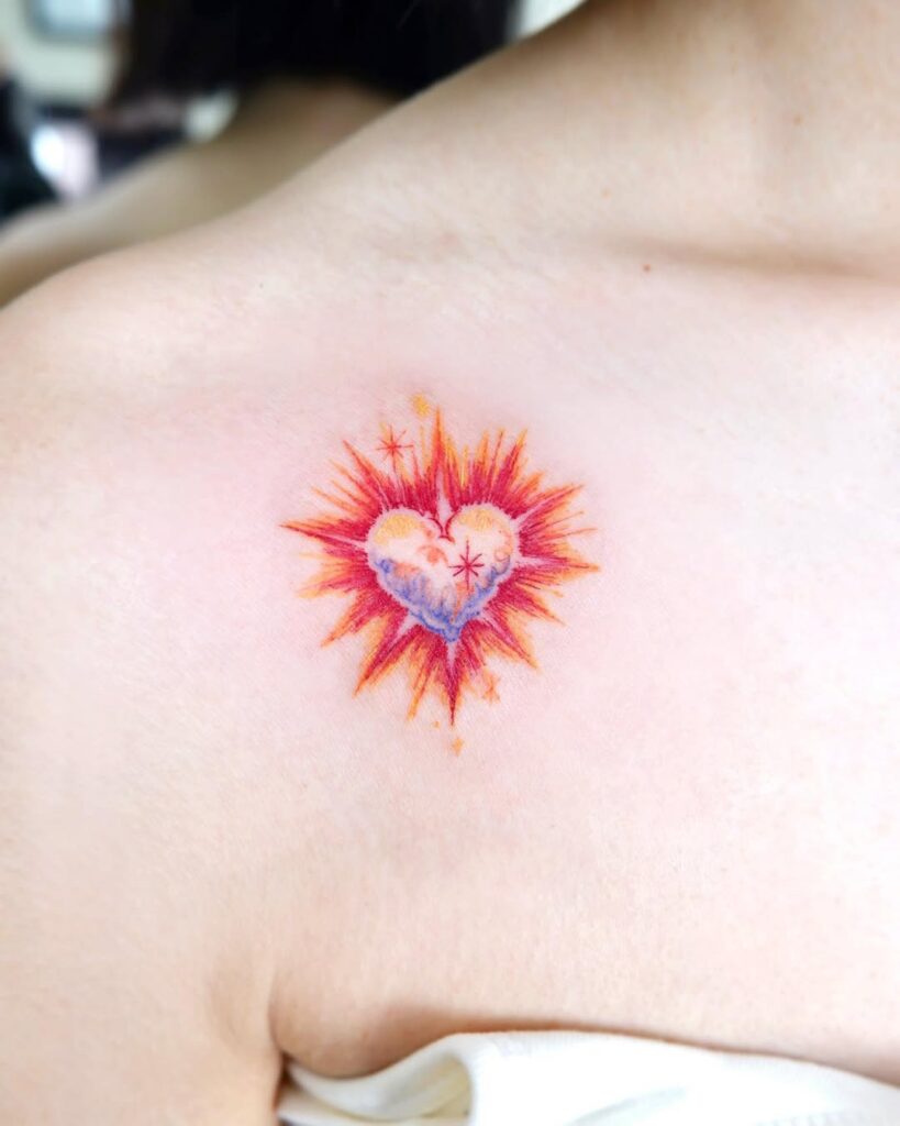 vibrant-heart-collarbone-tattoo