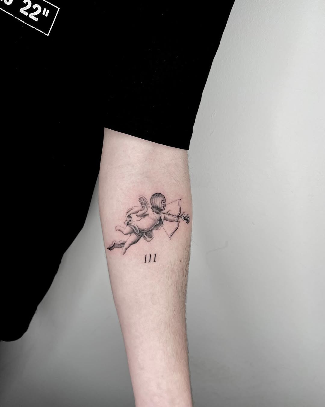 Chubby Cupid Tattoo with Bow and Arrow