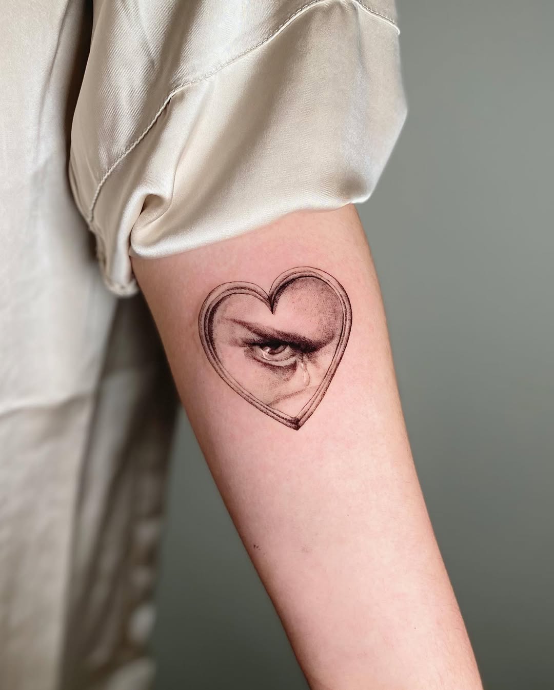 Heart-Shaped Eye Tattoo with a Unique Twist