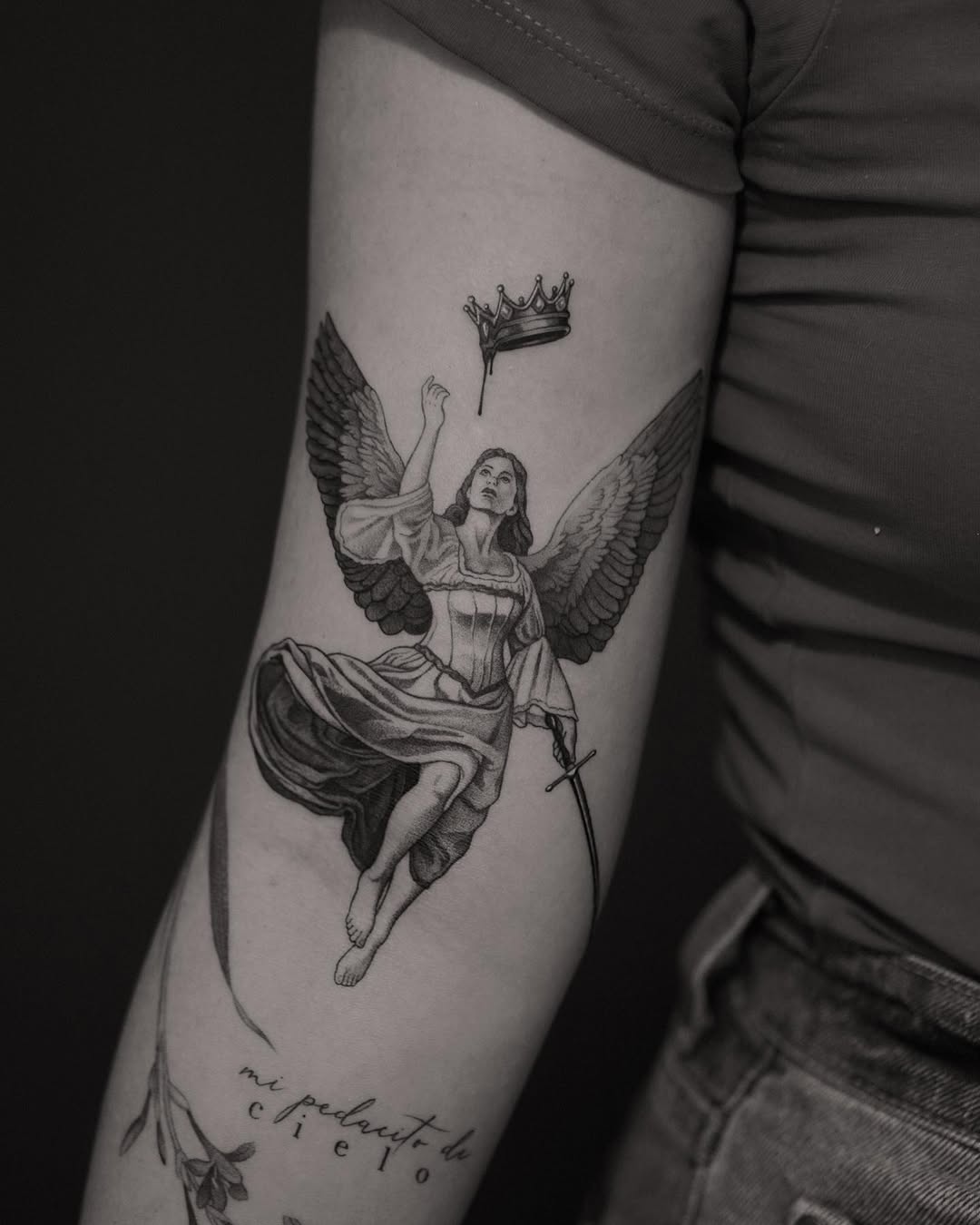 Majestic angel with sword and crown tattoo