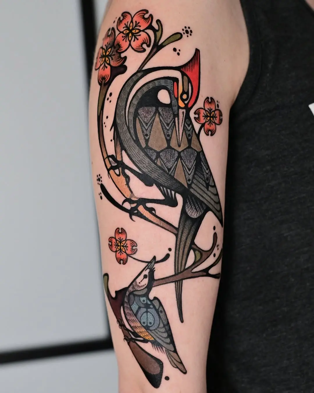 Elegant birds perched on blossoming branches