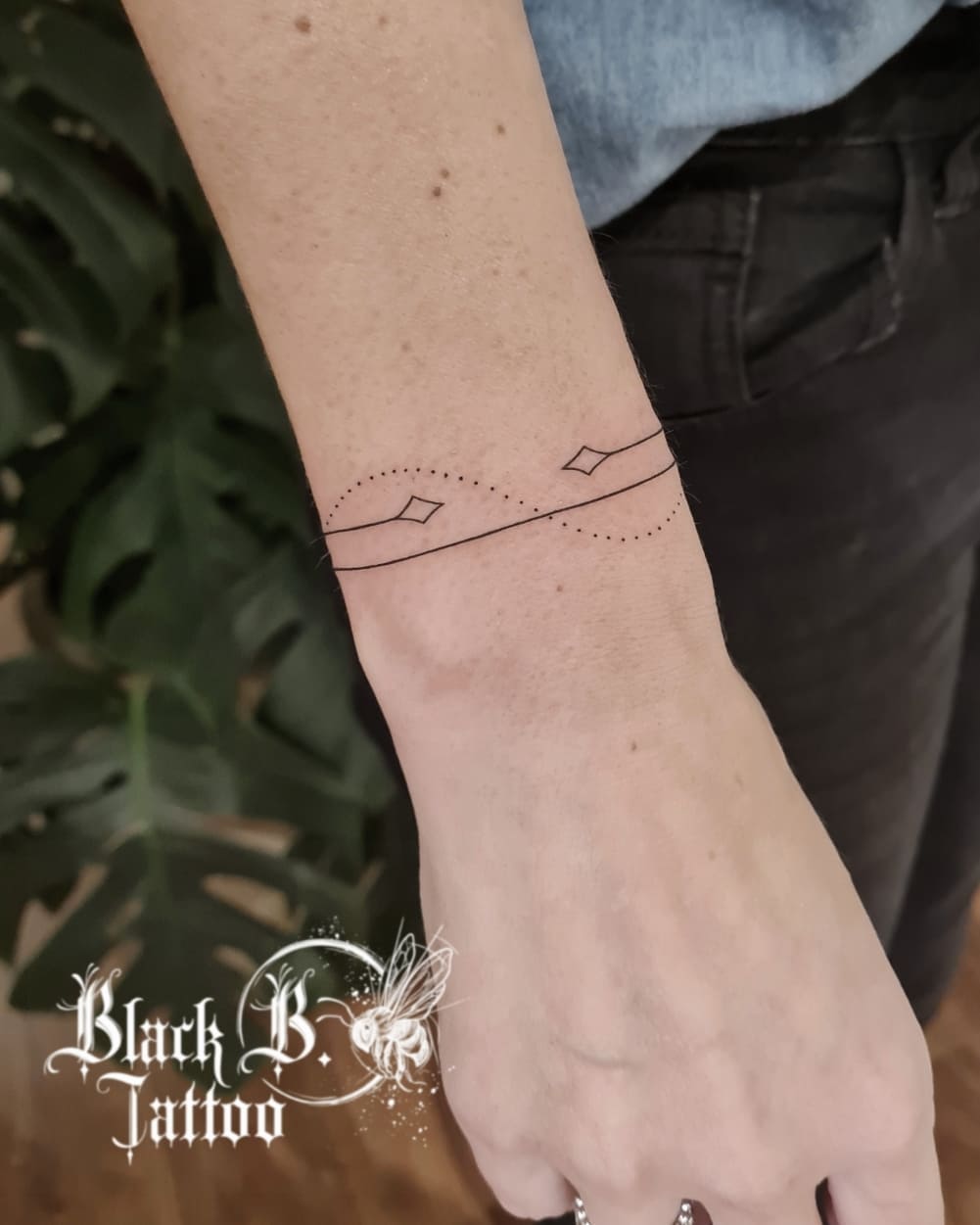 Sleek Minimalist Bracelet Tattoo Design