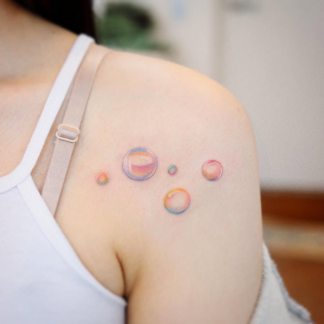 Vibrant Rainbow Bubble Tattoo Design Ideas