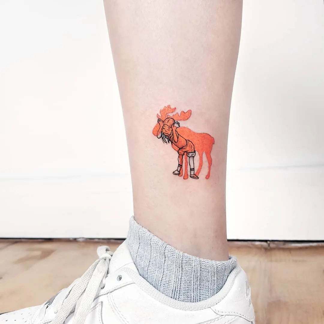 Casual deer tattoo with vibrant orange hues