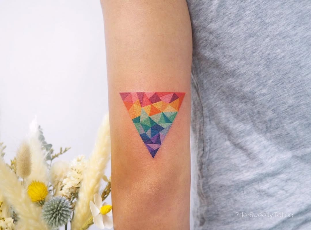 Vibrant Geometric Rainbow Triangle Tattoo Design