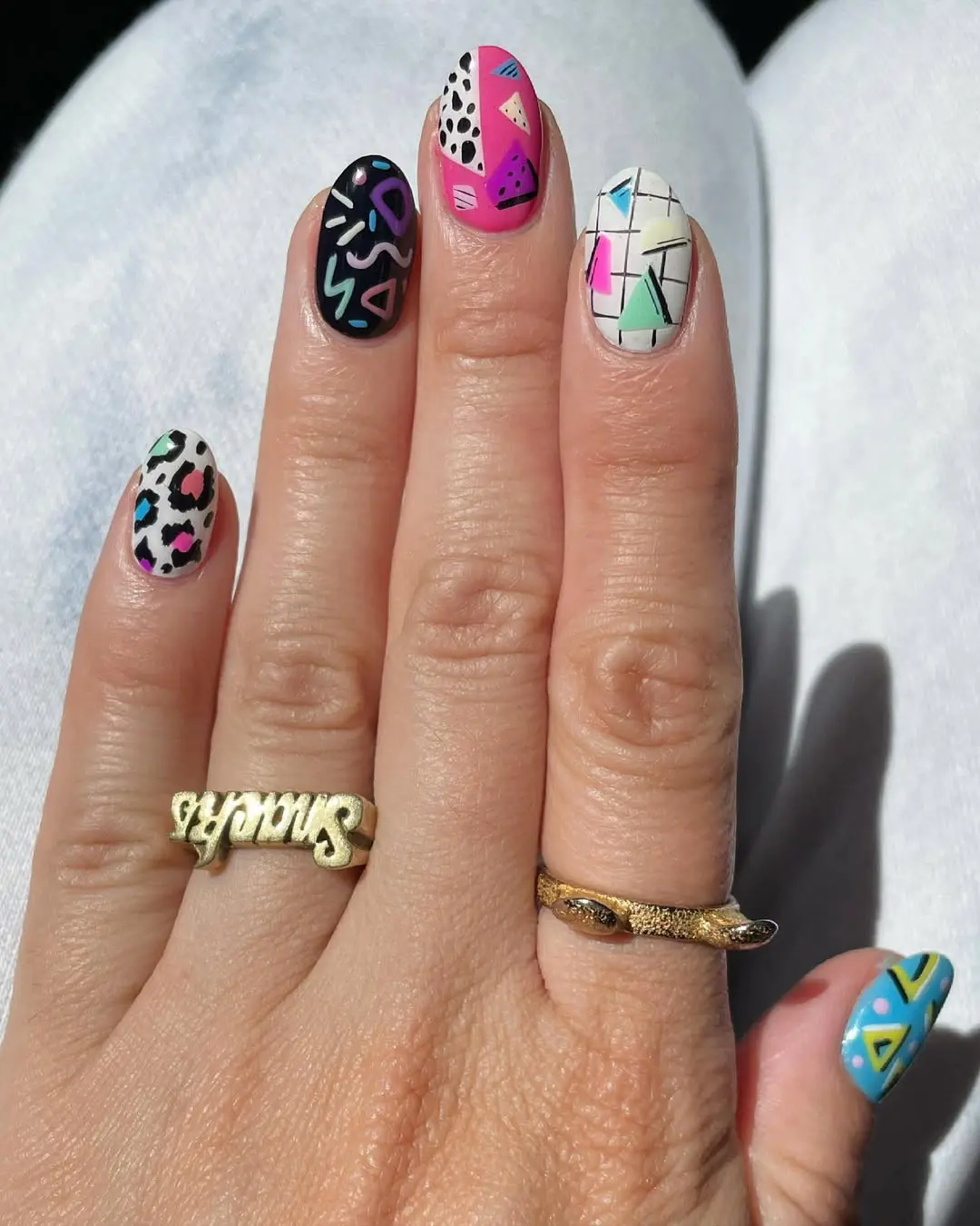 Vibrant nails showcasing a playful math aesthetic