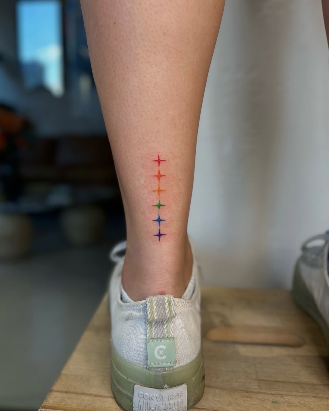 Vibrant Rainbow Tattoo on Leg