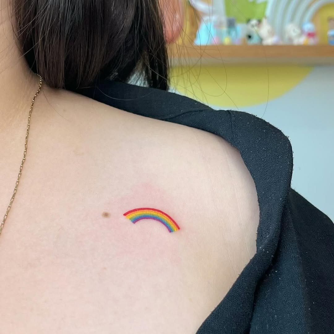 Charming Rainbow Tattoo on Shoulder Design