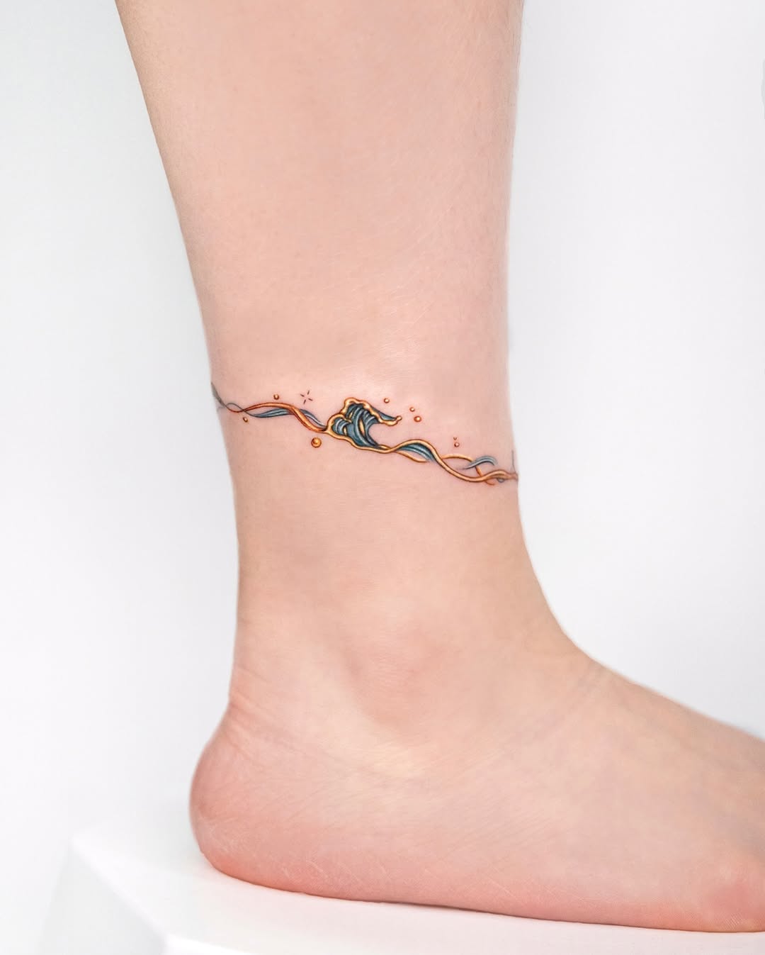 Stylish Ankle Wave Tattoo