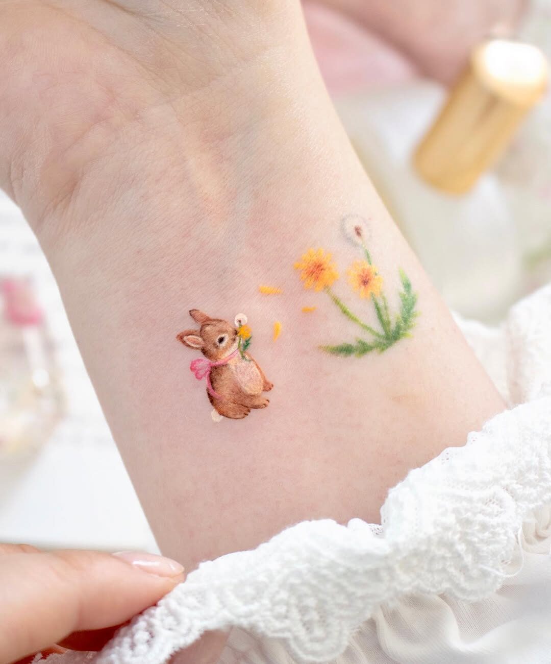 Whimsical Bunny Tattoo with Flowers